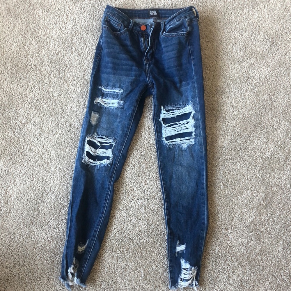 Fitted ripped jeans